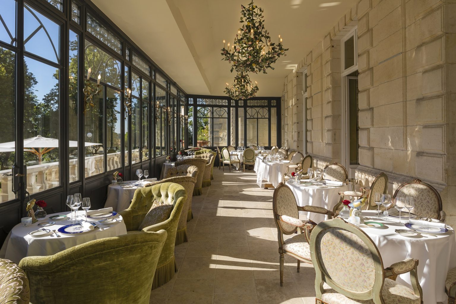 The glass Veranda laid for lunch, looking onto the park